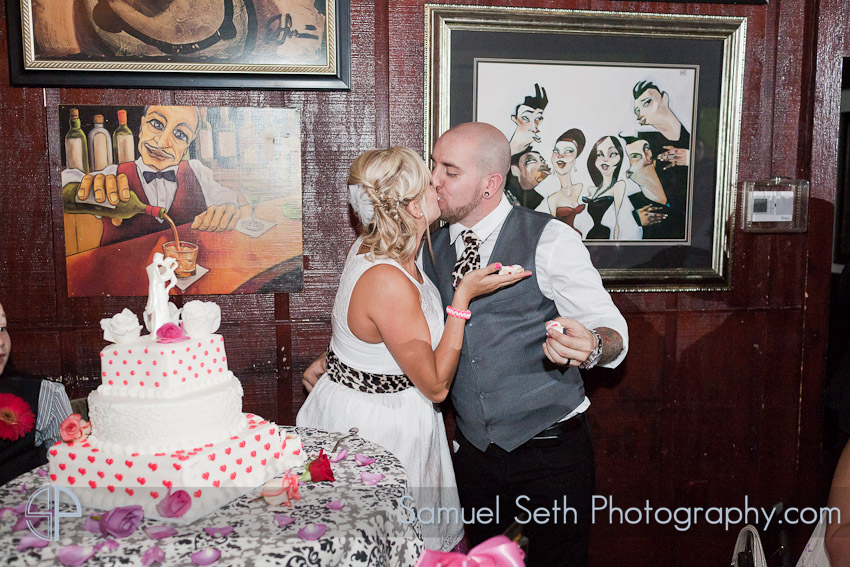 Erin and Nick Martinis and More Reception Cake Kiss