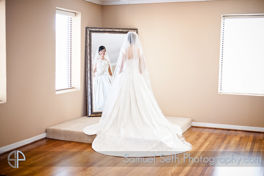 Bride Looking in Mirror The heights villa