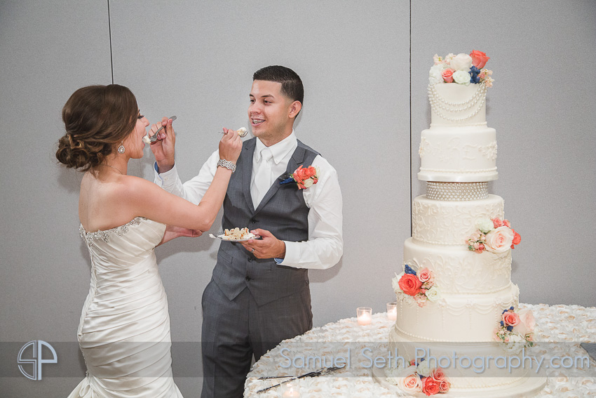 Feeding the Wedding Cake to each other