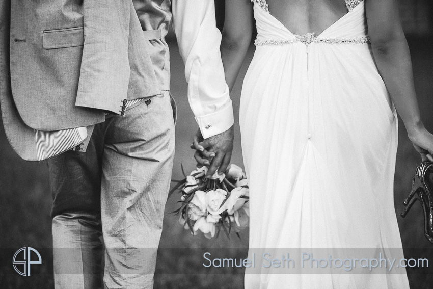 Black and White Wedding Photo outdoor holding hands