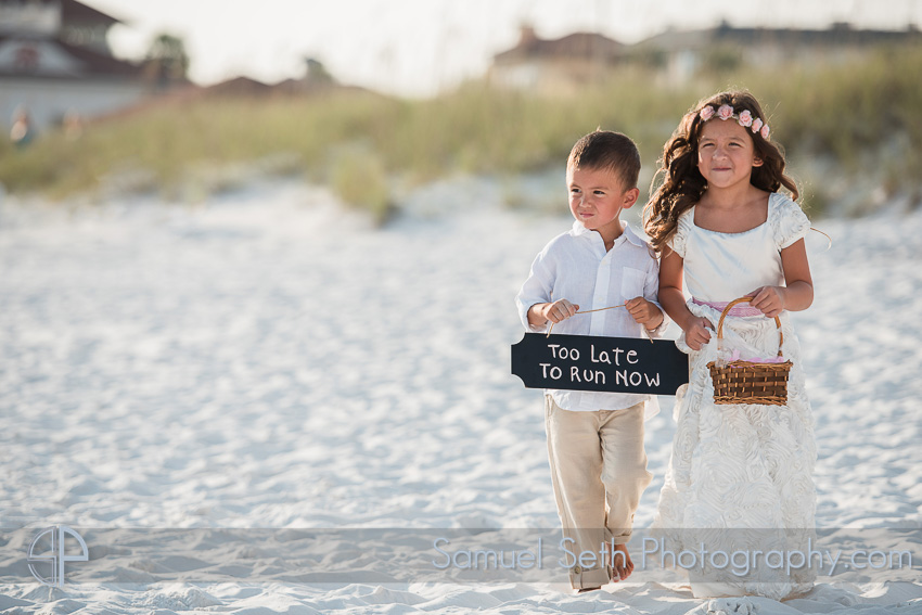 Ring Bearer holding sign beach wedding